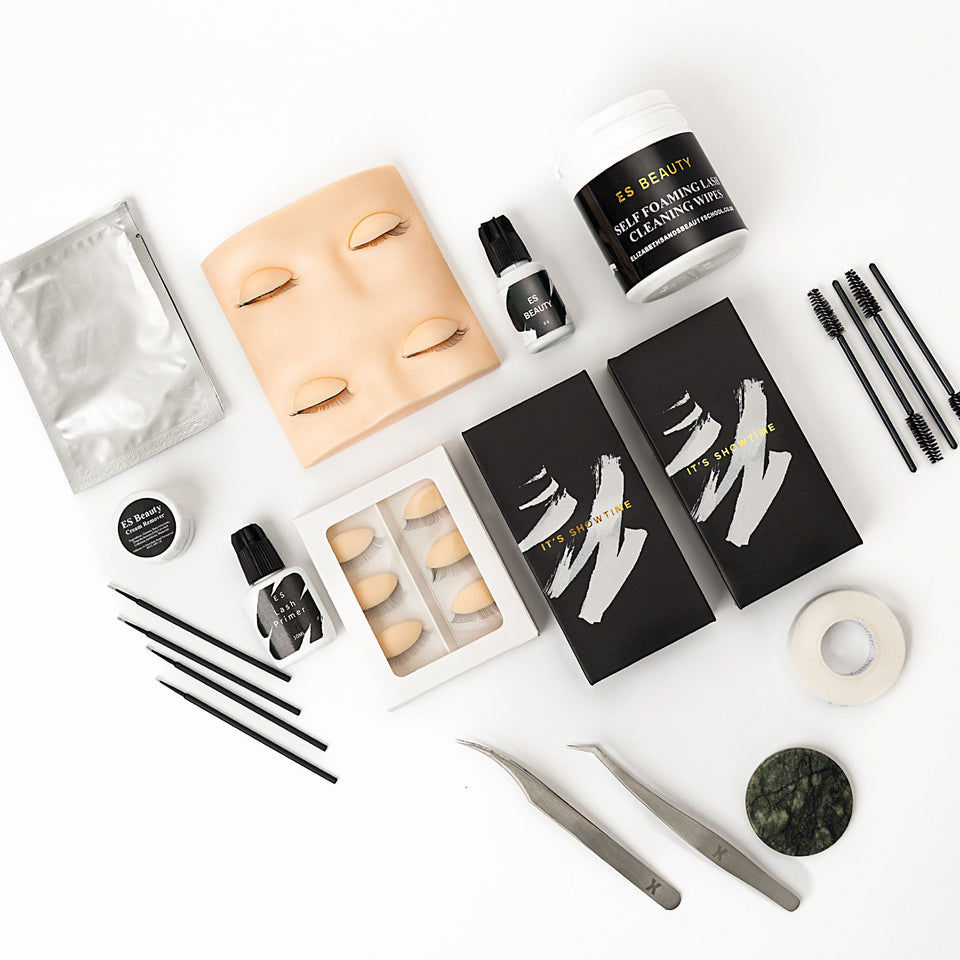 Collection of lash extensions products on a white background